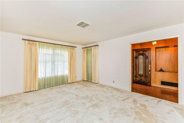 unfurnished room with carpet floors