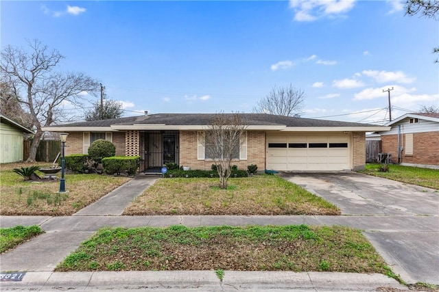 ranch-style house with a garage and a front yard