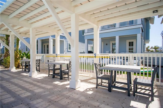 view of patio featuring outdoor dining area