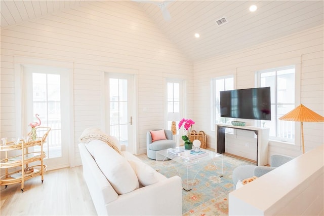 living area featuring light wood-type flooring, recessed lighting, lofted ceiling, and wood ceiling