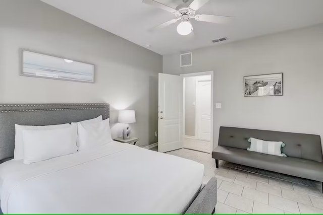 14202 Encantada Ave Unit 303, Corpus Christi, TX 78418 - bedroom featuring ceiling fan and light tile patterned flooring