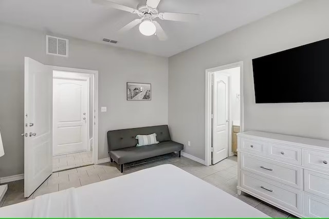 14202 Encantada Ave Unit 303, Corpus Christi, TX 78418 - bedroom with baseboards, light tile patterned flooring, connected bathroom, and a ceiling fan