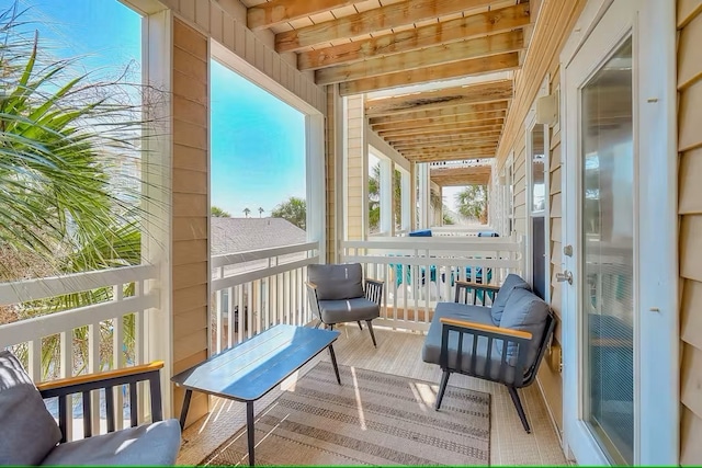 14202 Encantada Ave Unit 303, Corpus Christi, TX 78418 - sunroom / solarium with plenty of natural light and beam ceiling