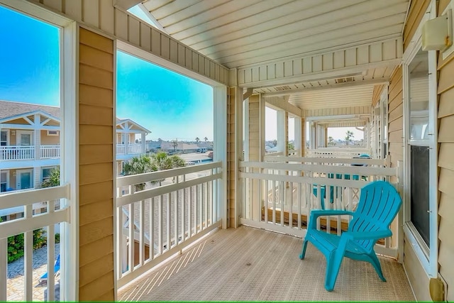 sunroom / solarium with wooden ceiling