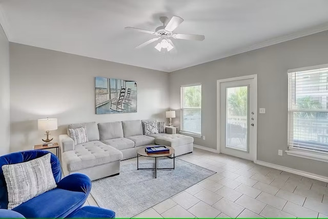 14202 Encantada Ave Unit 303, Corpus Christi, TX 78418 - living area with ceiling fan, baseboards, and light tile patterned flooring