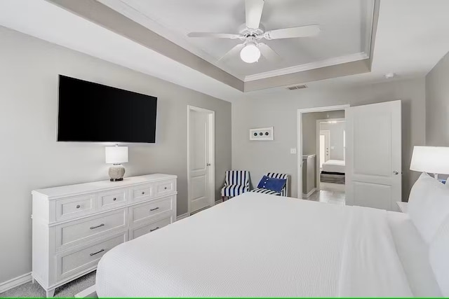 14202 Encantada Ave Unit 303, Corpus Christi, TX 78418 - bedroom with a raised ceiling, baseboards, a ceiling fan, and crown molding