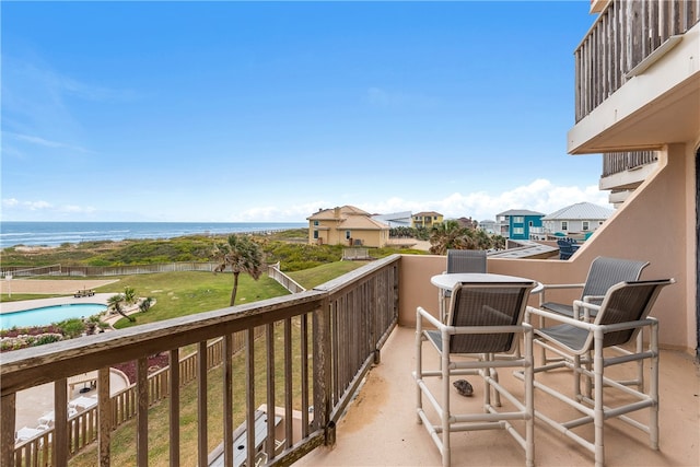 balcony featuring a water view