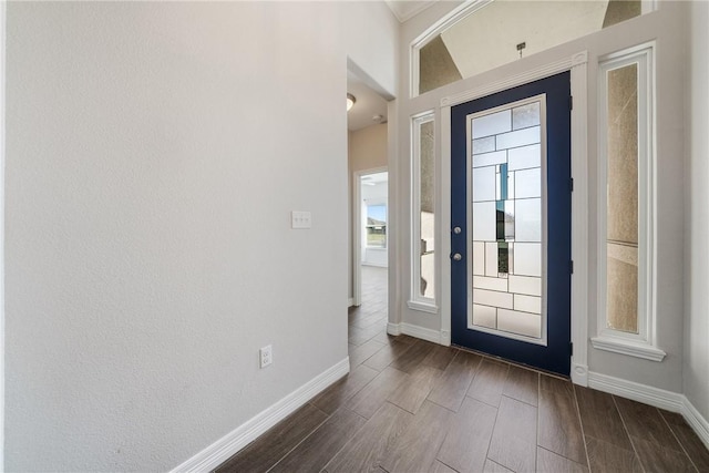 15629 Escapade St, Corpus Christi, TX 78418 - foyer entrance featuring baseboards and dark wood-style flooring