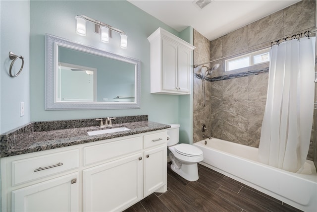 full bathroom with vanity, toilet, and shower / bathtub combination with curtain