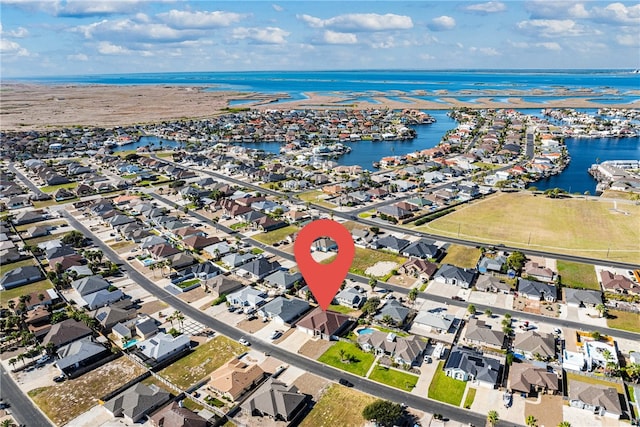 drone / aerial view with a water view