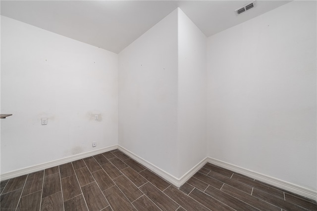 empty room featuring dark hardwood / wood-style floors