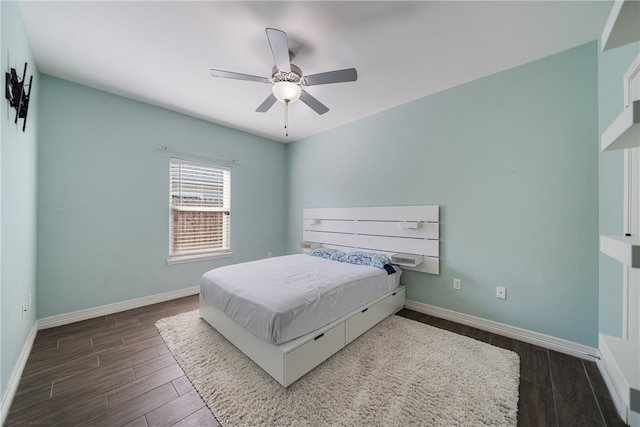 bedroom featuring dark hardwood / wood-style flooring and ceiling fan