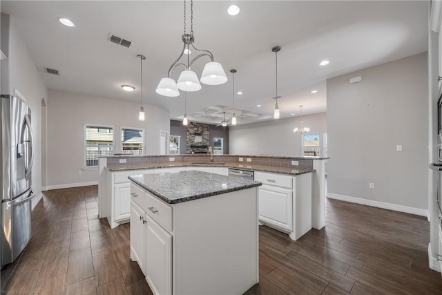 15629 Escapade St, Corpus Christi, TX 78418 - kitchen with appliances with stainless steel finishes, a center island, healthy amount of natural light, a ceiling fan, and recessed lighting
