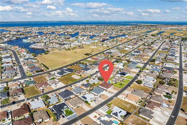 15629 Escapade St, Corpus Christi, TX 78418 - aerial view of property and surrounding area featuring nearby suburban area and a nearby body of water