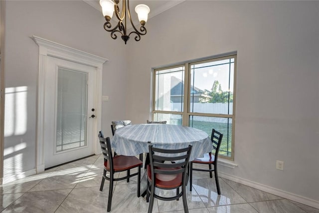 dining room with light tile patterned floors and an inviting chandelier