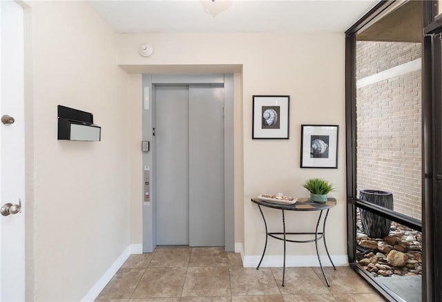 200 W Cotter Ave Unit B-3, Port Aransas, TX 78373 - entryway with elevator and baseboards