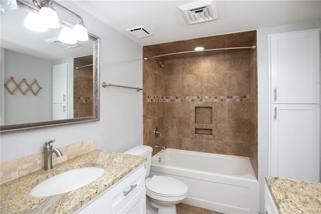 200 W Cotter Ave Unit B-3, Port Aransas, TX 78373 - bathroom featuring toilet, vanity, and shower / washtub combination