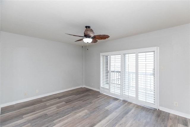 200 W Cotter Ave Unit B-3, Port Aransas, TX 78373 - spare room featuring ceiling fan, baseboards, and wood finished floors