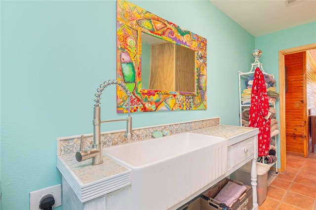 17 Bee Tree Cir, Rockport, TX 78382 - bathroom with tile patterned flooring and a sink
