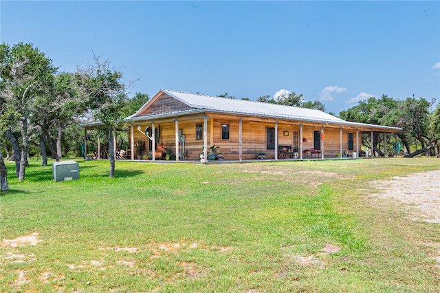 view of front of home featuring a porch and a front lawn