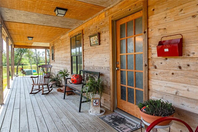 wooden deck featuring covered porch