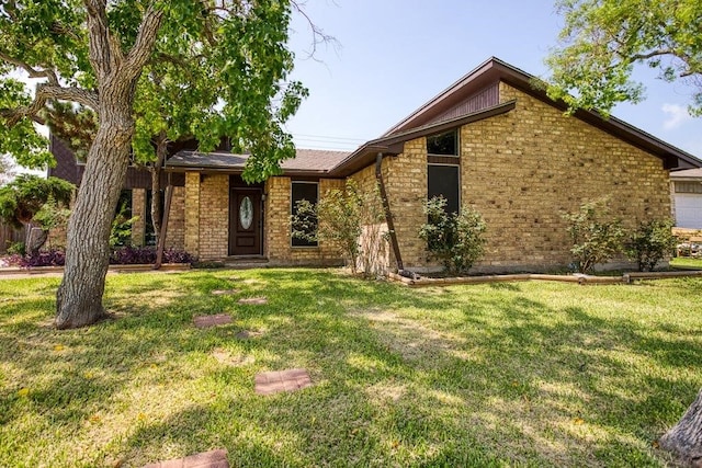 2307 Timber Ridge Dr, Portland, TX 78374 - view of front of property with a front lawn and brick siding