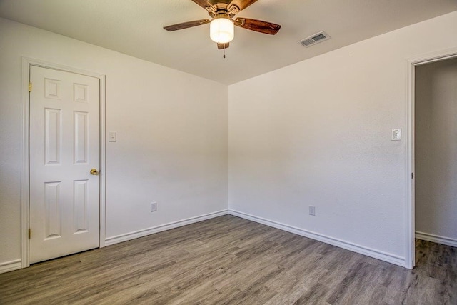2307 Timber Ridge Dr, Portland, TX 78374 - empty room featuring wood finished floors and a ceiling fan