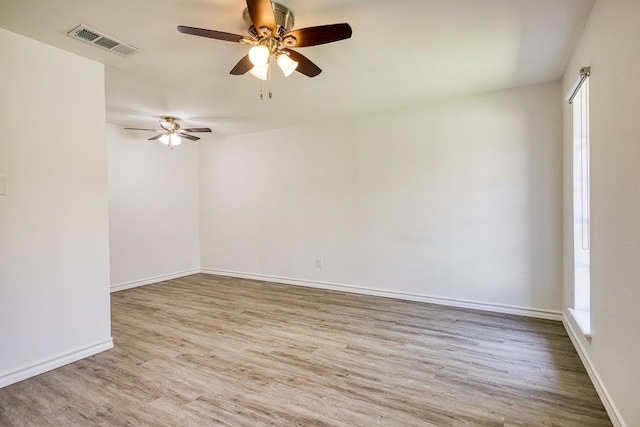 2307 Timber Ridge Dr, Portland, TX 78374 - spare room with wood finished floors and a ceiling fan