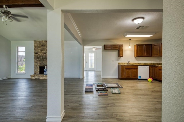 2307 Timber Ridge Dr, Portland, TX 78374 - living area with ceiling fan, wood finished floors, and a large fireplace