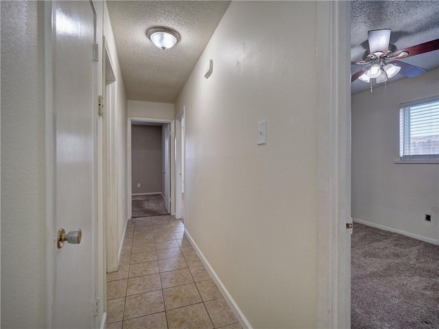 1638 Spicewood Dr, Corpus Christi, TX 78412 - hall with a textured ceiling and light tile patterned floors