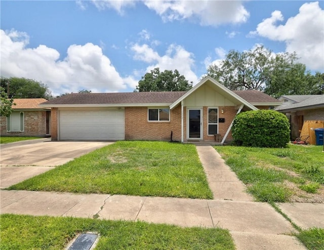 1638 Spicewood Dr, Corpus Christi, TX 78412 - single story home with concrete driveway, a garage, a front lawn, and brick siding
