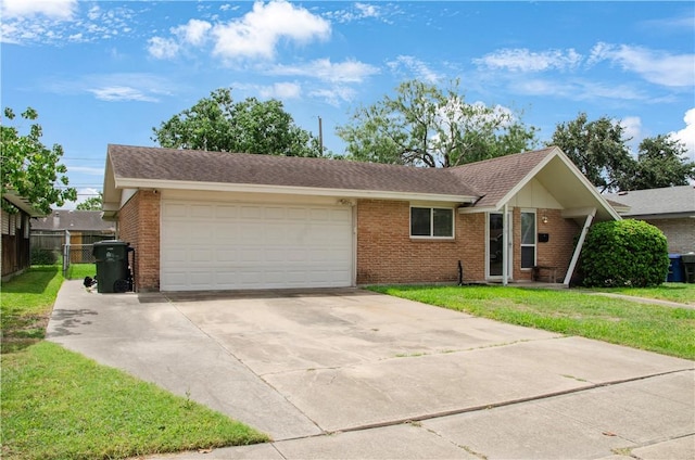 1638 Spicewood Dr, Corpus Christi, TX 78412 - single story home featuring brick siding, driveway, and a garage