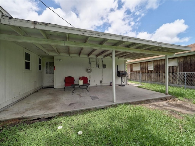 1638 Spicewood Dr, Corpus Christi, TX 78412 - view of patio with a carport and grilling area