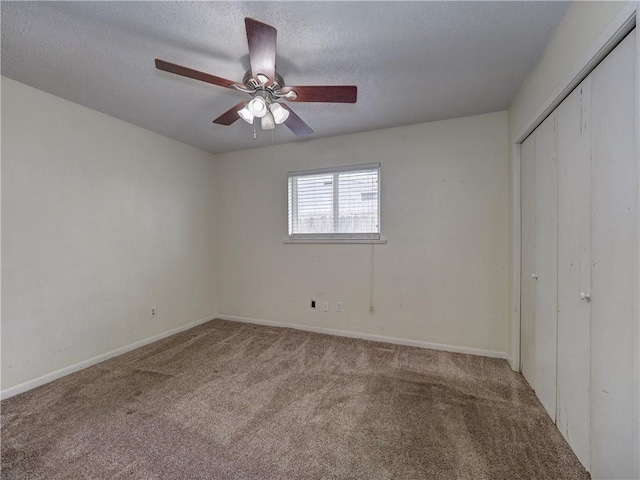 1638 Spicewood Dr, Corpus Christi, TX 78412 - unfurnished bedroom featuring carpet floors, a closet, a textured ceiling, and ceiling fan