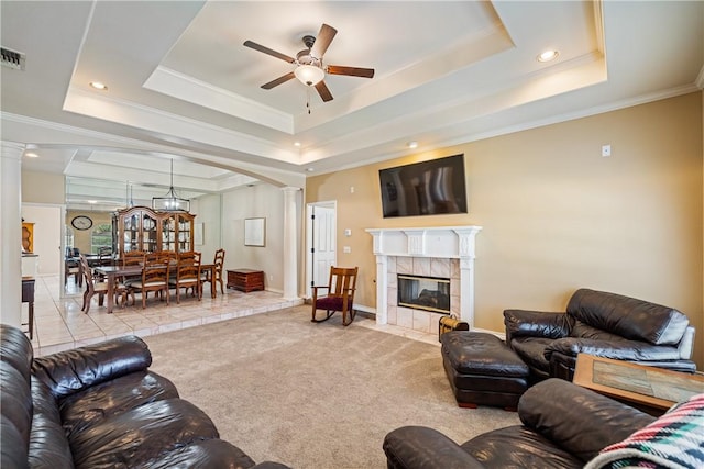 7526 Milan St, Corpus Christi, TX 78414 - carpeted living area featuring ornate columns, a tray ceiling, ceiling fan, crown molding, and recessed lighting