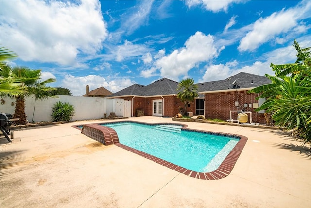 7526 Milan St, Corpus Christi, TX 78414 - view of swimming pool with a patio and french doors