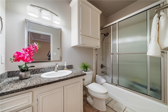 7526 Milan St, Corpus Christi, TX 78414 - bathroom featuring vanity, combined bath / shower with glass door, and tile patterned floors