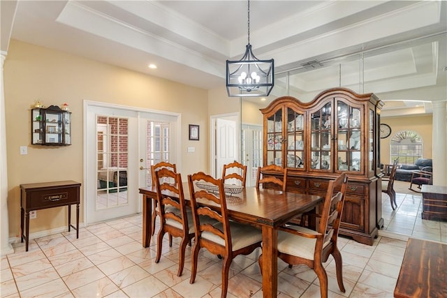 7526 Milan St, Corpus Christi, TX 78414 - dining area with a tray ceiling, french doors, a chandelier, ornamental molding, and light marble finish floors