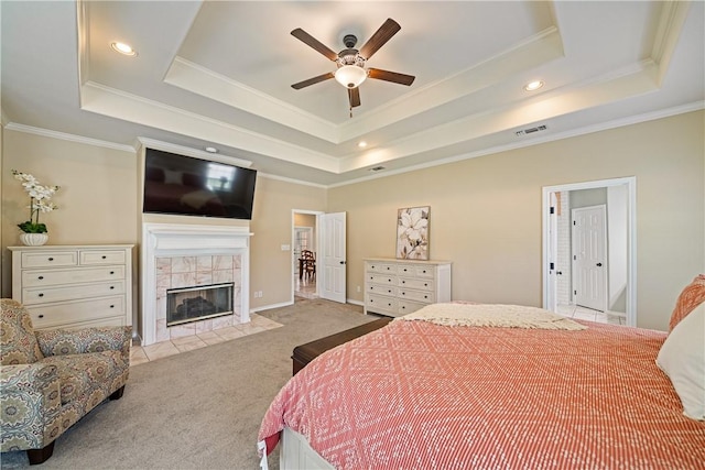 7526 Milan St, Corpus Christi, TX 78414 - bedroom with a raised ceiling, carpet floors, ornamental molding, a tiled fireplace, and recessed lighting