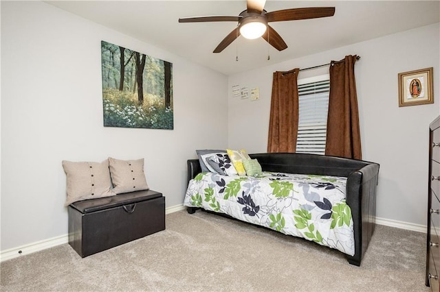bedroom featuring carpet floors, ceiling fan, and baseboards