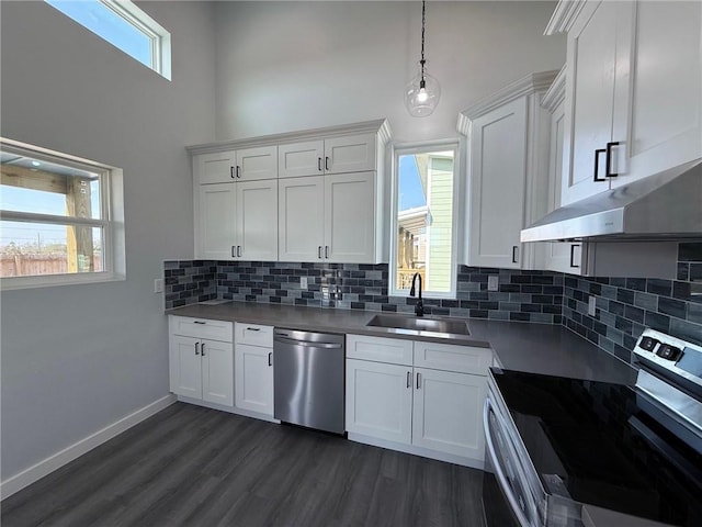 kitchen featuring sink, white cabinetry, and stainless steel appliances