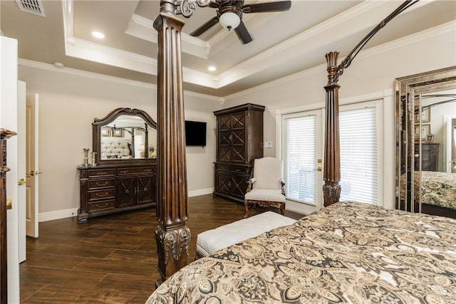 8102 Nazareth Dr, Corpus Christi, TX 78413 - bedroom featuring wood tiled floors, baseboards, ornamental molding, a tray ceiling, and ornate columns