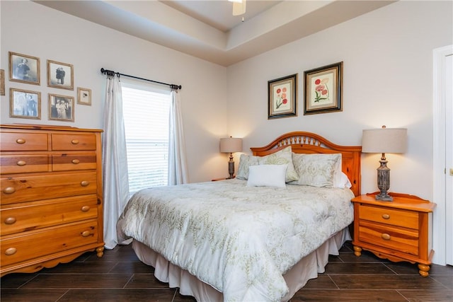 8102 Nazareth Dr, Corpus Christi, TX 78413 - bedroom featuring wood finish floors, a raised ceiling, and a ceiling fan