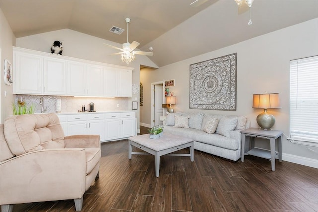 8102 Nazareth Dr, Corpus Christi, TX 78413 - living room with a ceiling fan, lofted ceiling, baseboards, and dark wood finished floors