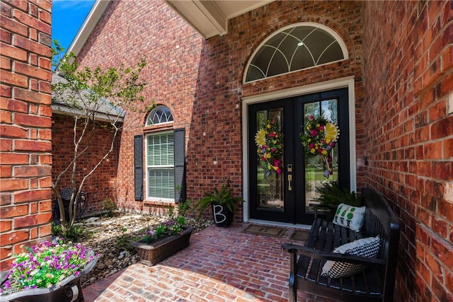 8102 Nazareth Dr, Corpus Christi, TX 78413 - doorway to property with brick siding and french doors