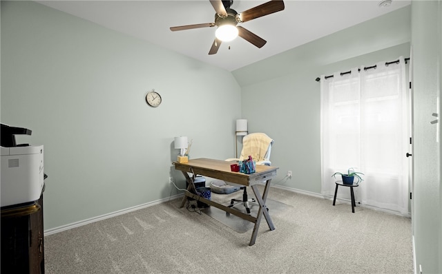 office area featuring ceiling fan, carpet floors, and vaulted ceiling