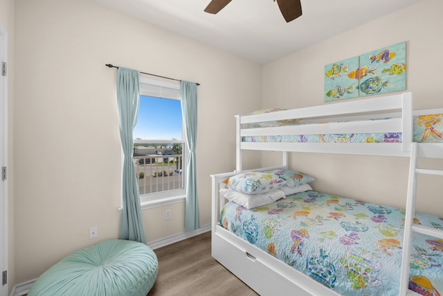 bedroom featuring hardwood / wood-style flooring and ceiling fan