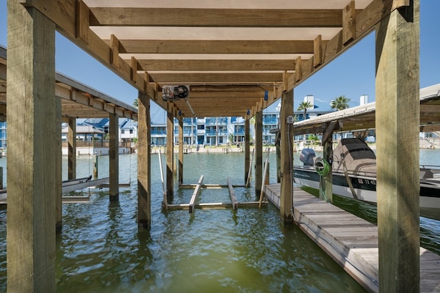 dock area featuring a water view