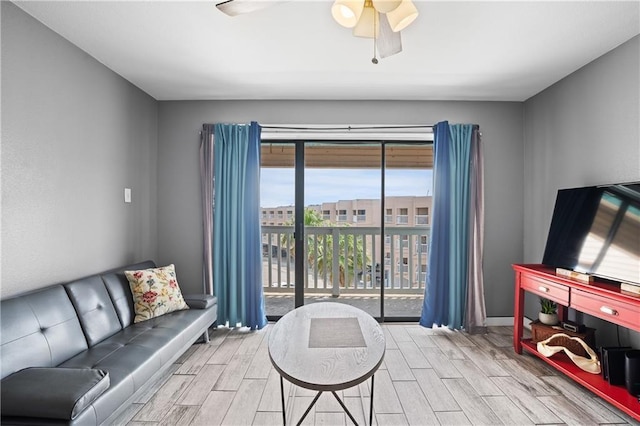 3938 Surfside Blvd Unit 3342, Corpus Christi, TX 78402 - living room featuring wood tiled floors and a ceiling fan