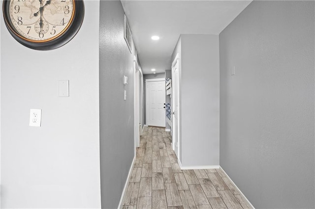 3938 Surfside Blvd Unit 3342, Corpus Christi, TX 78402 - hallway with light wood-style flooring and recessed lighting